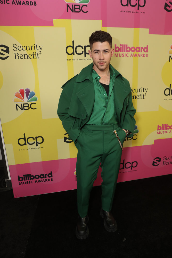 The annual Billboard Music Awards took place yesterday evening, Nick Jonas was the host of the star-studded event. Celebrities showed up to the covid-safe event in some stunning red carpet looks. Here are some of the best looks from the award show.