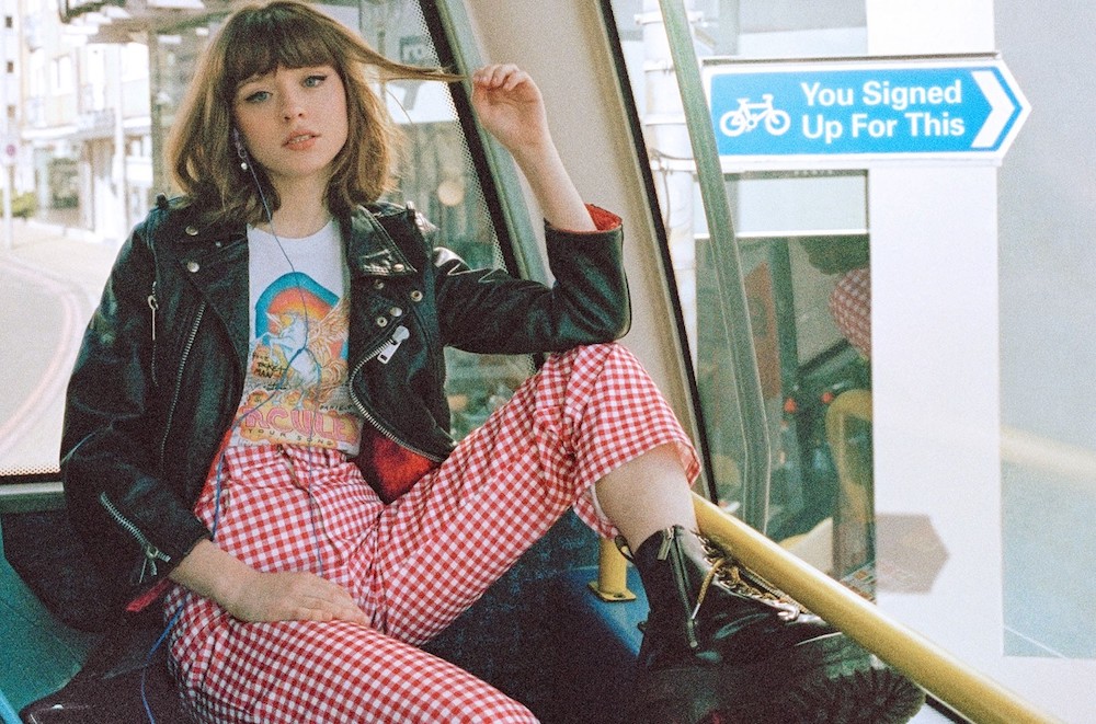 Maisie Peters, 21, is getting ready to release her first LP on August 27 titled You Signed Up For This. Along with the news, Peters also announced that she is signing with Ed Sheeran’s label Gingerbread Man Records. For Peters, this is a huge step in her career at such a young age. In fact, Peters was the youngest artist to write and curate a soundtrack for Apple TV's original series Trying just last year. On the soundtrack, she worked side-by-side with another British artist, James Bay.