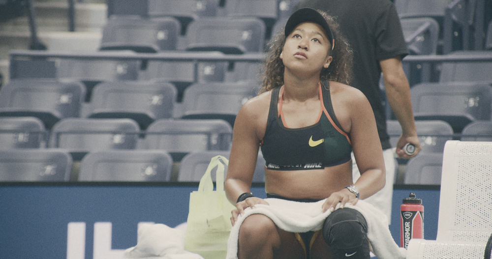 On July 6, Netflix released a brand new trailer and powerful key art for Naomi Osaka's upcoming documentary. In mid-July, fans of Osaka can expect a three-part documentary series on Netflix about the pressures of being a famous tennis player.