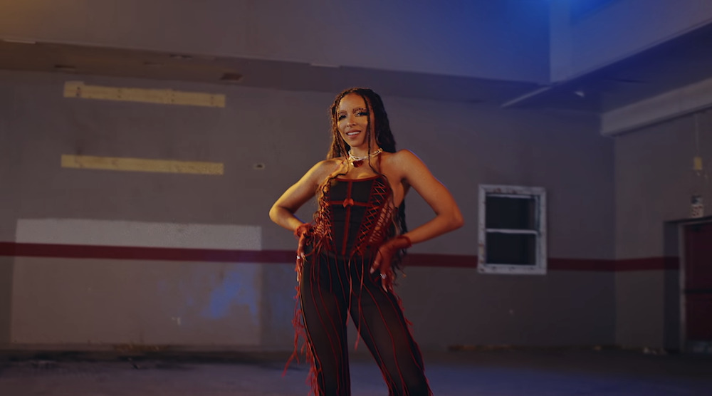 Trampolines and balance beams assist Tinashe with some booty popping moves in her new single 