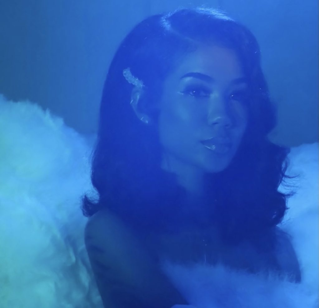 Jhené Aiko has done it again with her latest single, "Wrap Me Up," a dreamy track perfect to listen to on repeat this holiday season. The artist dropped the song on December 14, leaving fans wanting more. 