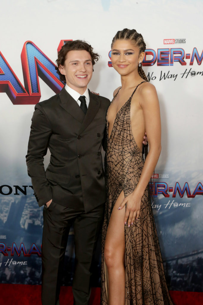 Tom Holland and Zendaya stunned on the red carpet during the Los Angeles premiere of their movie, Spider-Man: No Way Home on Monday, December 13. 