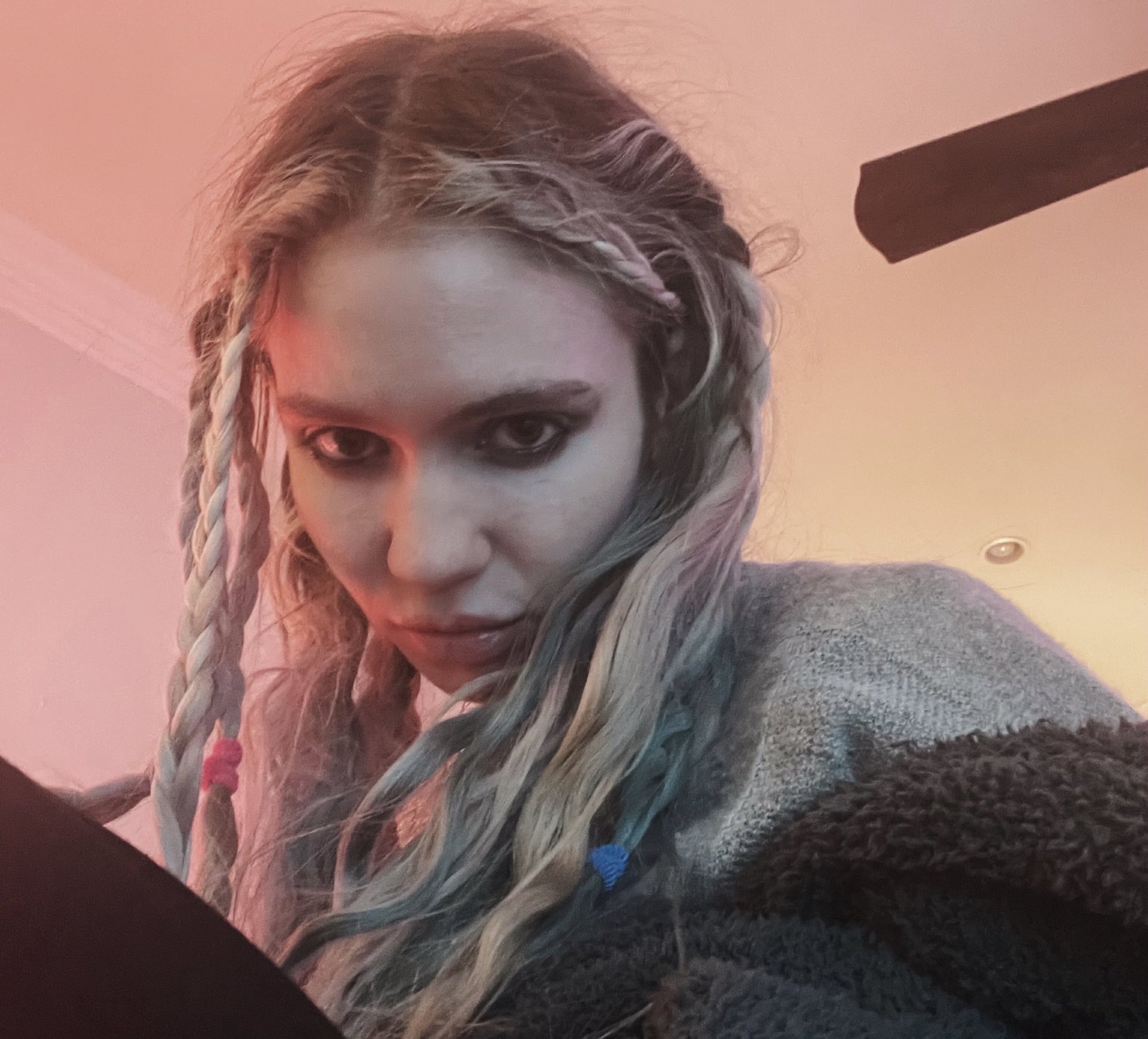 Grimes teases new song Player Of Games with messages in binary code