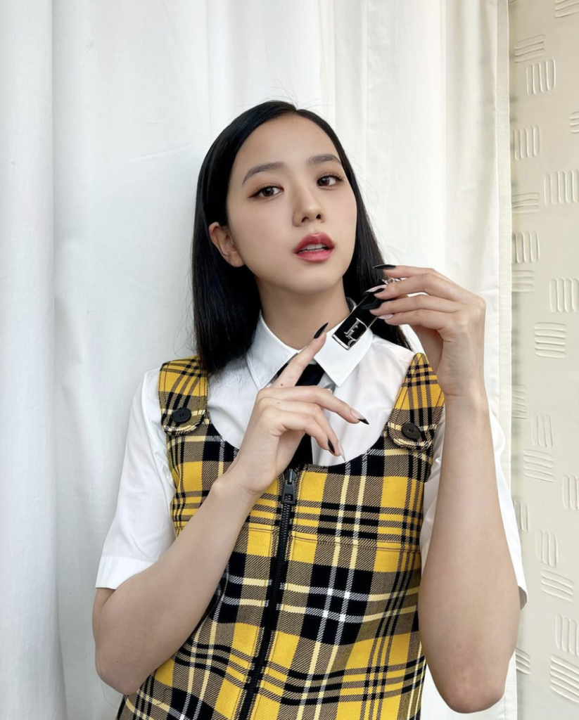 On March 1, Jisoo from BLACKPINK attended the Dior's Fall 2022 Runway Show channeling Cher Horowitz from Clueless in a yellow tartan mini dress. The K-pop star looked stunning as Dior kicked off day 2 of Paris Fashion Week. 