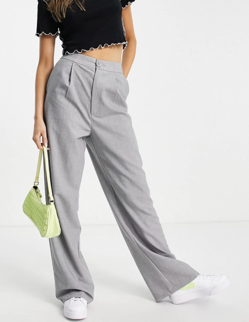 Pair these relaxed-fit pants with close-fitting crop tops for a flattering and laid-back silhouette this spring. Pants with a relaxed fit are comfortable and can elevate a simple outfit by adding interesting volumes. If you are in the mood to change your style, these bottoms are safe additions to anyone’s wardrobe. We have picked out four different options from ASOS in various fabrics to suit your aesthetics.