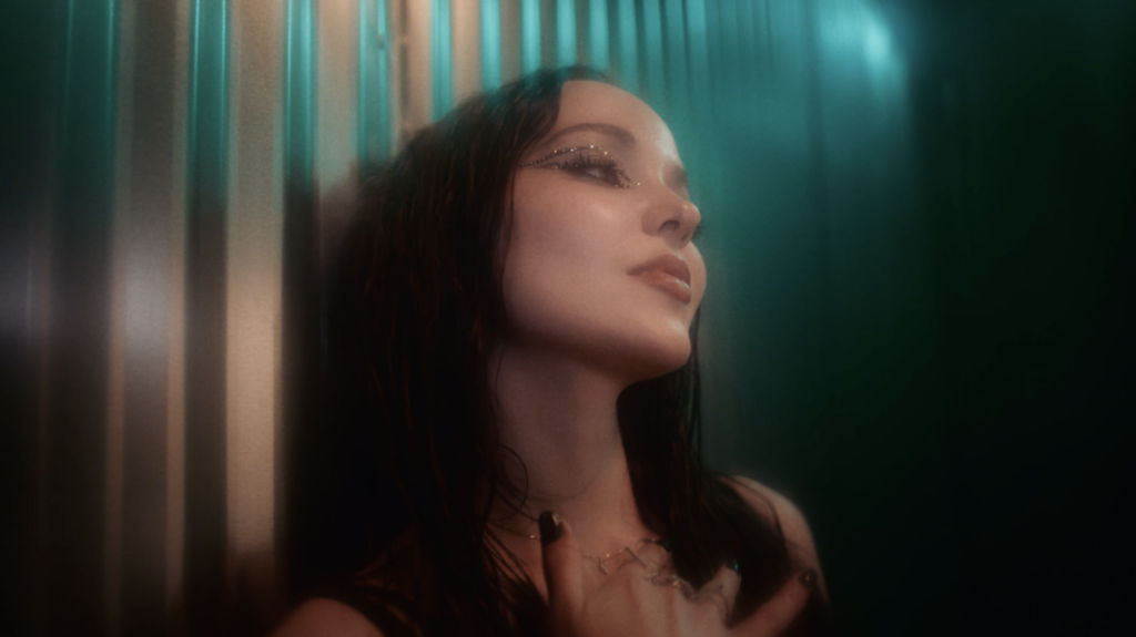 Dove Cameron finally dropped the highly-anticipated music video for her hit single “Boyfriend” on Thursday, and it is an absolute masterpiece. With sapphic lovers, stunning imagery, and sensual stares, the queer anthem’s visual experience is unlike any other. 