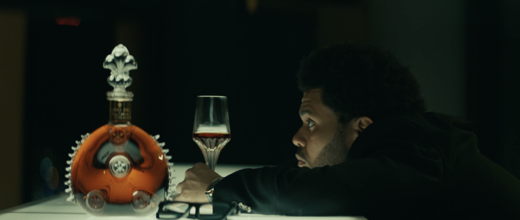 The Weeknd dropped the official music video for his hit song “Out of Time” on Tuesday, and the two guest appearances were everything. Starring opposite Squid Game star Jung Ho-yeon, The Weeknd engages in a night of karaoke and playful flirtation with his newfound love interest. 