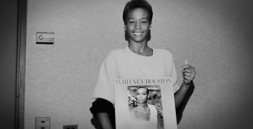 The first round of promotional media is finally here for the highly anticipated Whitney Houston biopic, I Wanna Dance With Somebody. The first poster showcases a stunning photo of Starwars actor Naomi Ackie, who will play the iconic pop singer in the film. The film will premiere on December 21.