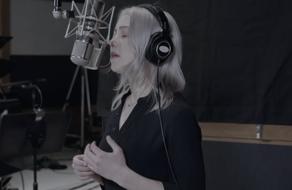 Phoebe Bridgers is back with new music. The "Moon Song" singer released an accompanying music video for the Hulu limited drama series, Conversations with Friends. The track is titled "Sidelines." 