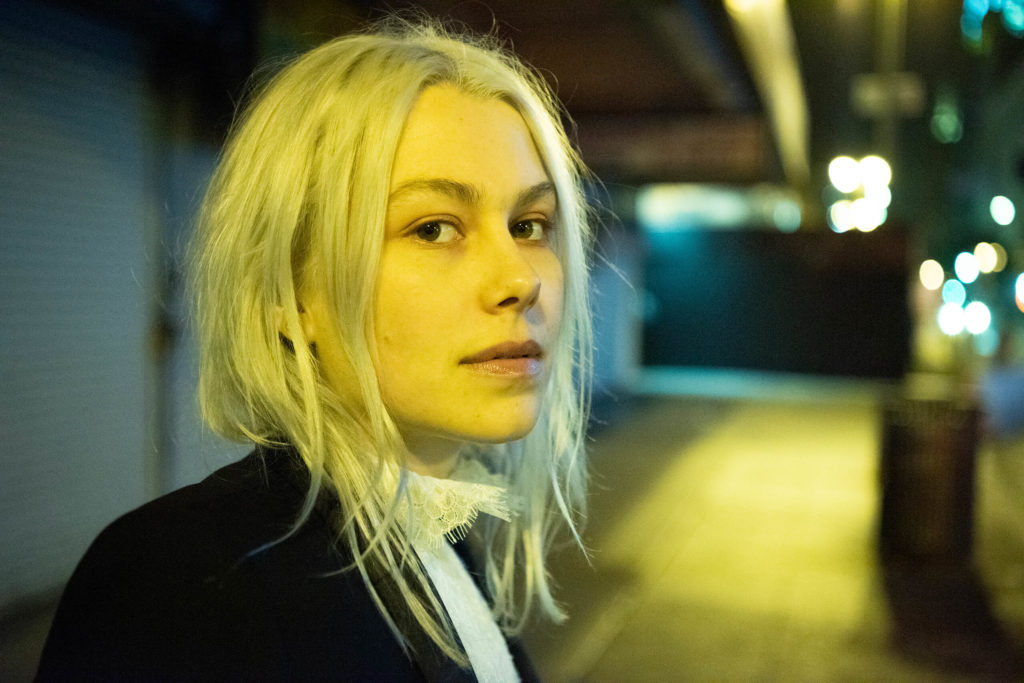Phoebe Bridgers' "Sidelines" music video was released on Wednesday during her ongoing Reunion Tour. This song was created for Conversations with Friends, a Hulu Original series. Her brother, Jackson Bridgers, directed the music video. The music video contains a montage of clips taken on tour. Bridgers will be making an appearance on The Tonight Show Starring Jimmy Fallon where she will be performing "Sidelines" on June 15.