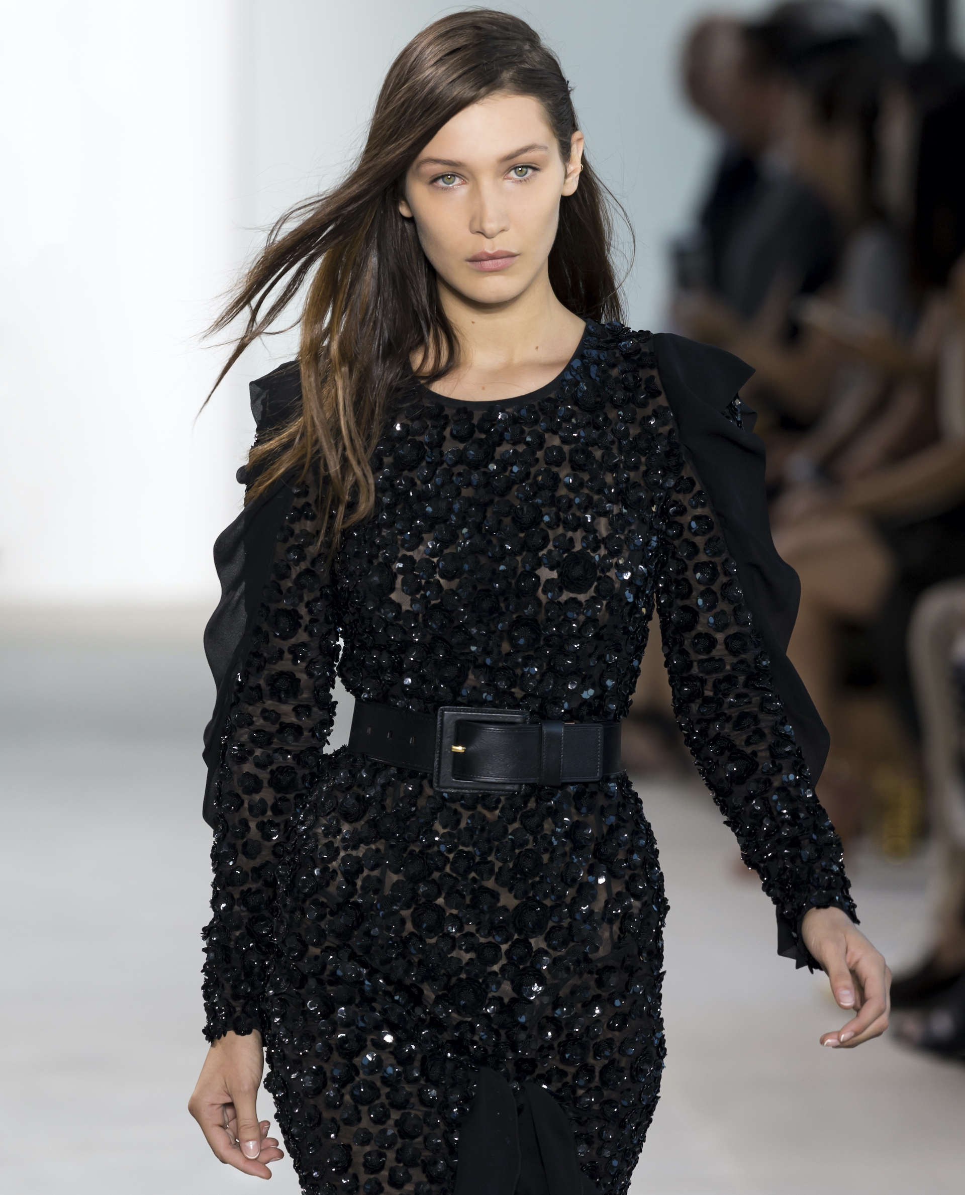 The audience's jaws dropped when seeing the evolution of Bella Hadid's spray-on dress in the middle of the Coperni fashion show in Paris.