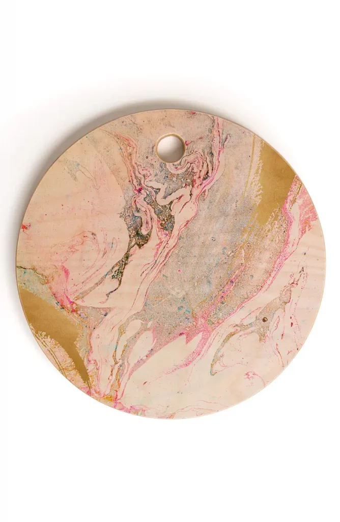 The Iveta Abolina Birch Wood Cutting Board has that perfect circular shape for a charcuterie board. The swirl paint splatters make the board look very aesthetic in its design. Start your journey to the butter board trend with this art-inspired board for $35 here. 