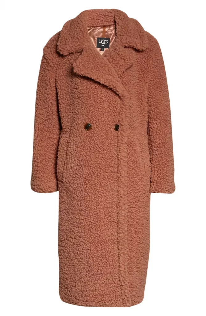 Need a long, oversized jacket that will keep you even warmer? The UGG Gertrude Long Teddy Coat is double-breasted and features faux-shearling. The extra layer of warmth will keep you very cozy in this incredible jacket for just $248 here. With different colors to choose from, you can layer and style it with different accessories. 