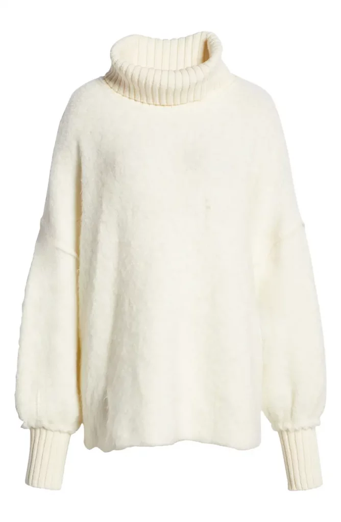 Looking for a cute, cozy sweater for the cold weather? Look no further than the Free People Milo Tunic Sweater, on sale here for $88.80. This is the perfect oversized sweater that features a turtleneck that will keep you comfortable all season long. This sweater also comes in different colors, all of which are very stunning. 