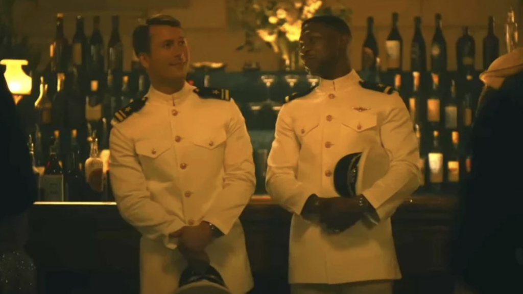 Glen Powell (Top Gun: Maverick) stars as Tom Hudner, the wingman for Jonathan Majors’ (Lovecraft Country, The Harder They Fall, Loki) real-life character Jesse Brown, the first Black aviator in Navy history in Sony Pictures’ Devotion. 