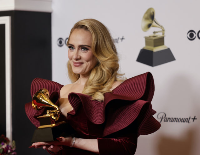 At the Grammy Awards, Adele won an award for Best Pop Solo Performance for her hit single “Easy on Me,” while meeting the one and only Dwayne Johnson.