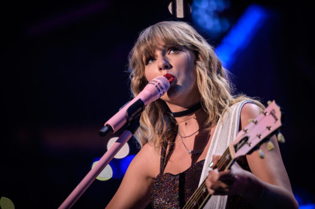 While on her blockbuster Eras Tour in Texas, Taylor Swift gave her iconic “22” hat to a lucky local dancer in the audience.