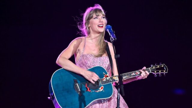 Taylor Swift is breaking yet another record with the debut of her concert film, 'Taylor Swift: The Eras Tour,' surpassing Justin Bieber's 'Never Say Never.'