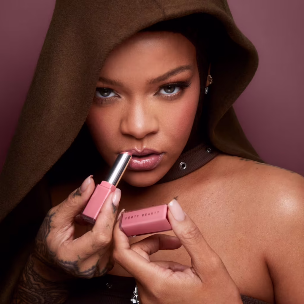 Fenty Beauty just dropped 4 new Gloss Bomb Stix nudes for every skin tone. See the shades, the formula, and where to shop them now.