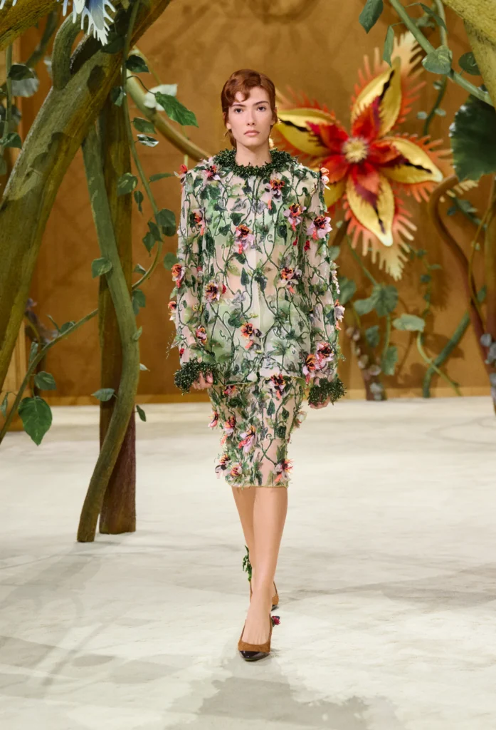 On the second day of Paris Haute Couture Week, creative director Matthieu Blazy unveiled his second couture collection for the House, and darling, he did not come to play it safe. Titled "Gaby and the Beanstalk," the Fall/Winter 2026-2027 collection was born from a book of fairytales — Les Fées, Contes des Contes — that Blazy discovered tucked away in Gabrielle Chanel's personal library. From that single spark, he built an entire enchanted world inside the Grand Palais.