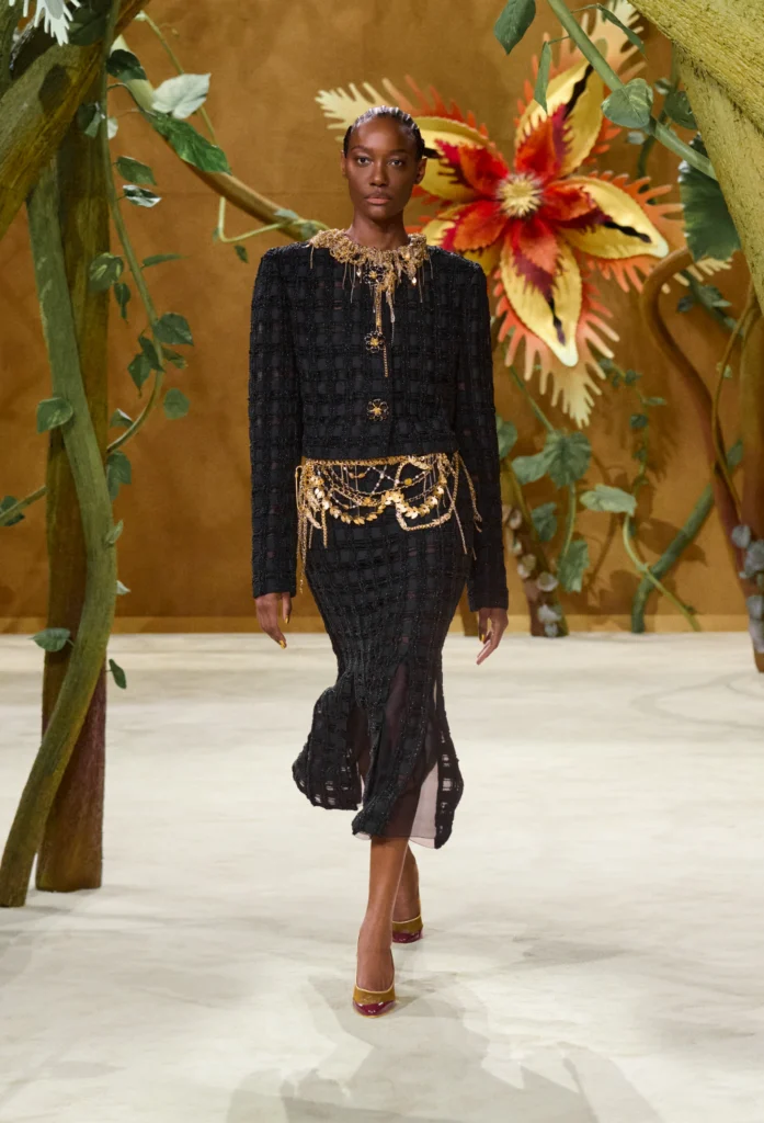On the second day of Paris Haute Couture Week, creative director Matthieu Blazy unveiled his second couture collection for the House, and darling, he did not come to play it safe. Titled "Gaby and the Beanstalk," the Fall/Winter 2026-2027 collection was born from a book of fairytales — Les Fées, Contes des Contes — that Blazy discovered tucked away in Gabrielle Chanel's personal library. From that single spark, he built an entire enchanted world inside the Grand Palais.