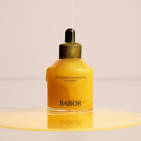 BABOR Soul & Body Shimmer Oil nourishes skin, strengthens the barrier, and leaves a luminous glow. Here's our editors' take on the luxe body oil.