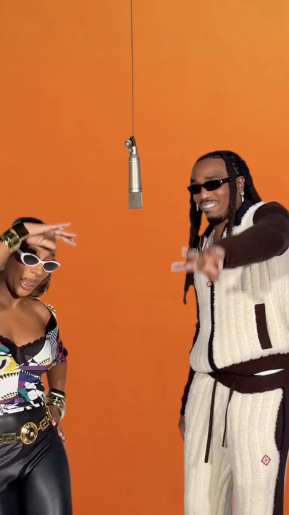 Victoria Monét recreated the viral AI trend in real life with Quavo to celebrate their new albums, with a clear 'No AI' message championing human art.