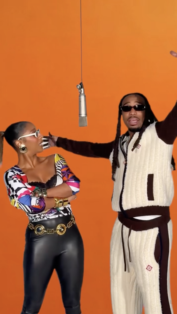 Victoria Monét recreated the viral AI trend in real life with Quavo to celebrate their new albums, with a clear 'No AI' message championing human art.
